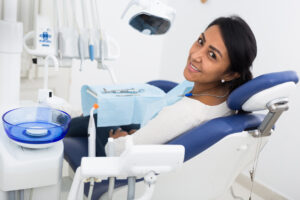 Woman ready for dental care cracked tooth treatment