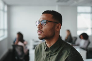 Man staring pensively