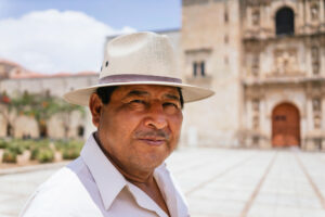 Older man in white hat